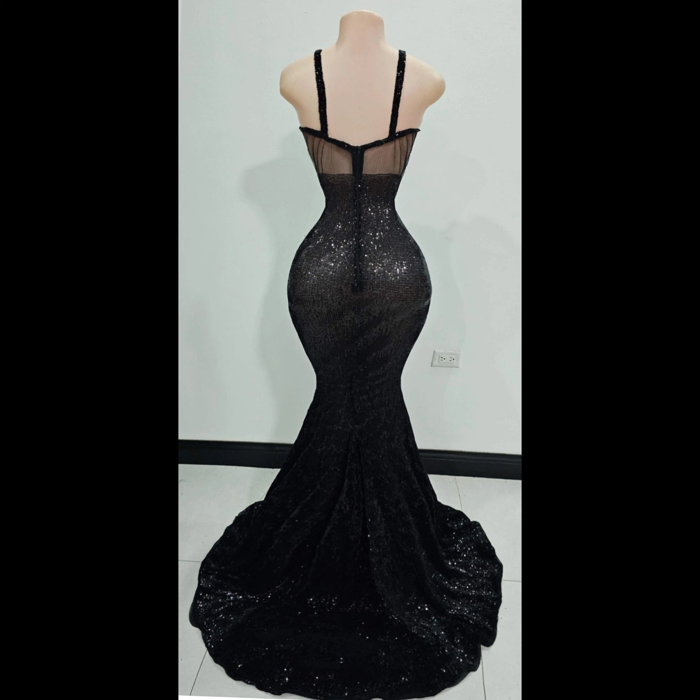 Back view of silver sequin mermaid dress with rhinestone detailing